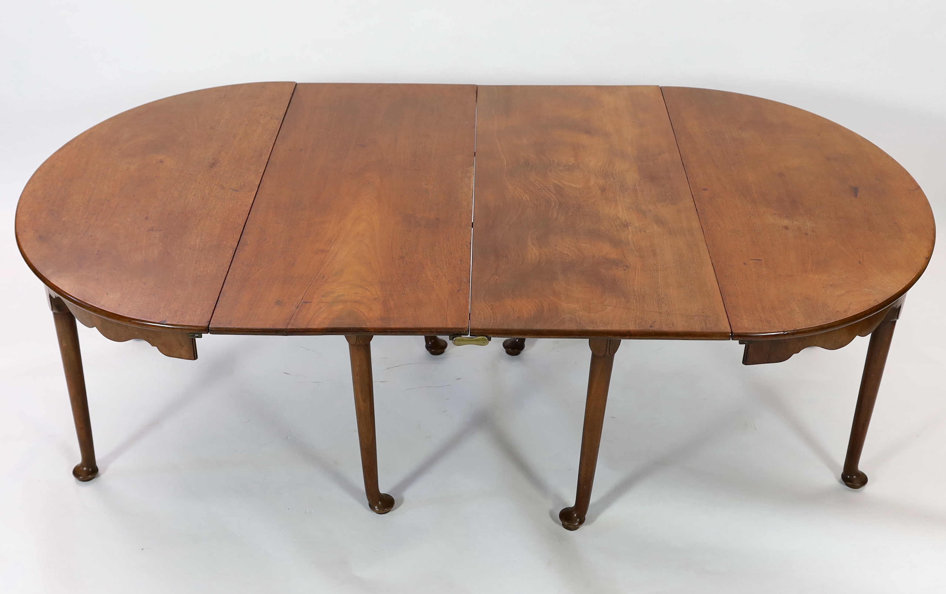 A George II mahogany extending dining table, extends to 230cm x 137cm